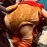Atticus joined the competition — help win amazing prizes! baby, costume, animal_costume, red_hood, striped_socks, blur, movement, blanket, cozy, fuzzy, infant, crawling, child, legs, feet, warm_clothing, soft_texture, indoors, fabric, cute