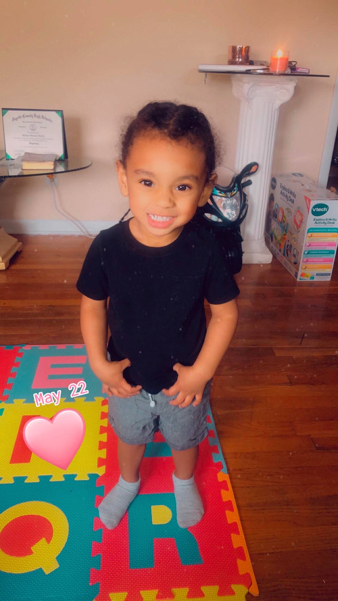 Marcello is registered to the contest to win money with this photo: child, floor, flooring, joy, person, play, standing, toddler