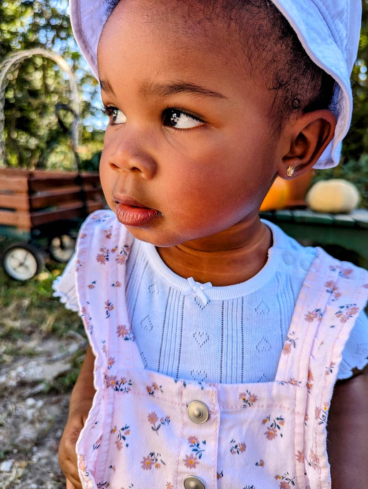 Zariyah is registered to the contest to win money with this photo: baby_toddler_clothing, blue, cheek, child, chin, dress, eyelash, face, grass, happy, head, jewellery, lip, neck, nose, person, skin, sleeve, summer, t_shirt