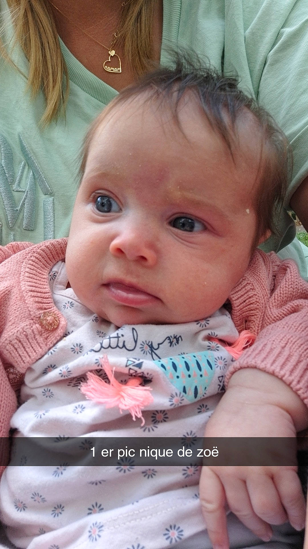 Zoe participe au concours pour gagner de l'argent avec cette photo : baby, baby_toddler_clothing, cheek, child, chin, ear, eyelash, finger, grass, happy, iris, lip, mouth, nose, person, pink, product, sitting, skin, sleeve