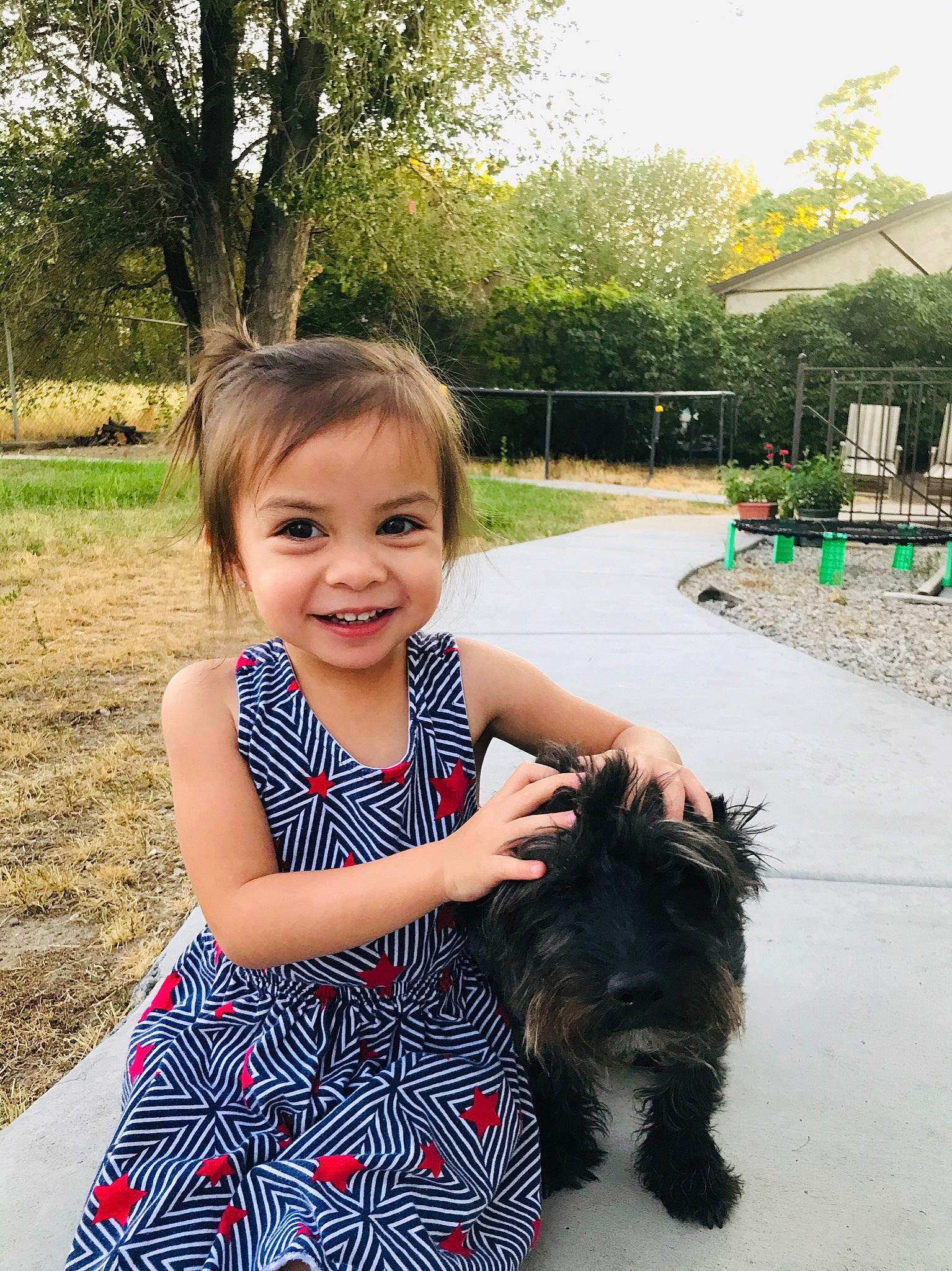 Nathalie is registered to the contest to win money with this photo: affenpinscher, cairn_terrier, canidae, carnivore, child, companion_dog, dog, dog_breed, happy, joy, morkie, person, puppy, skin, smile, summer, toddler, vacation