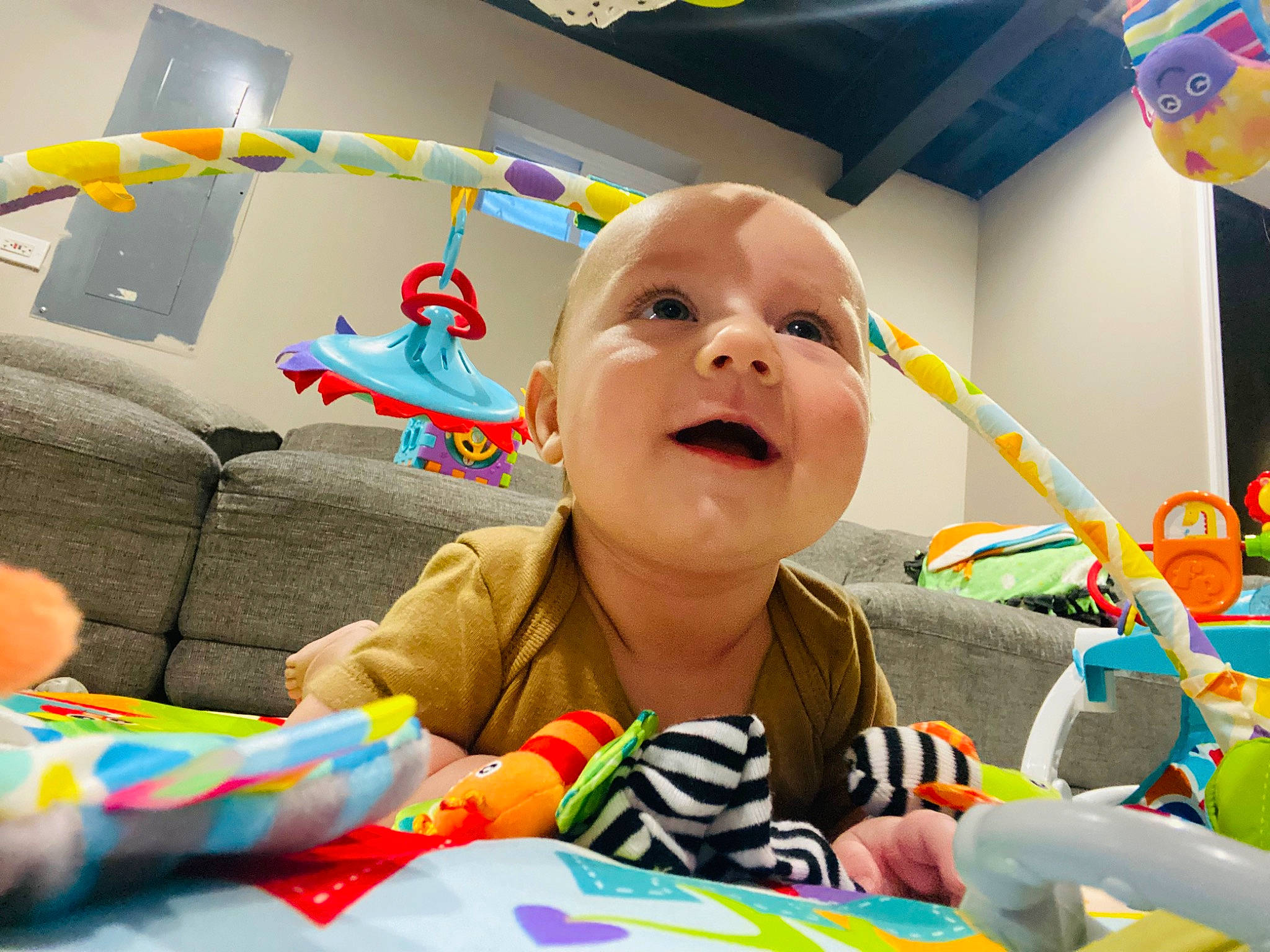 Maxton is registered to the contest to win money with this photo: baby, baby_playing_with_toys, baby_products, baby_toddler_clothing, baby_toys, cheek, child, comfort, fun, happy, leisure, linens, person, play, room, sitting, smile, textile, toddler, toy