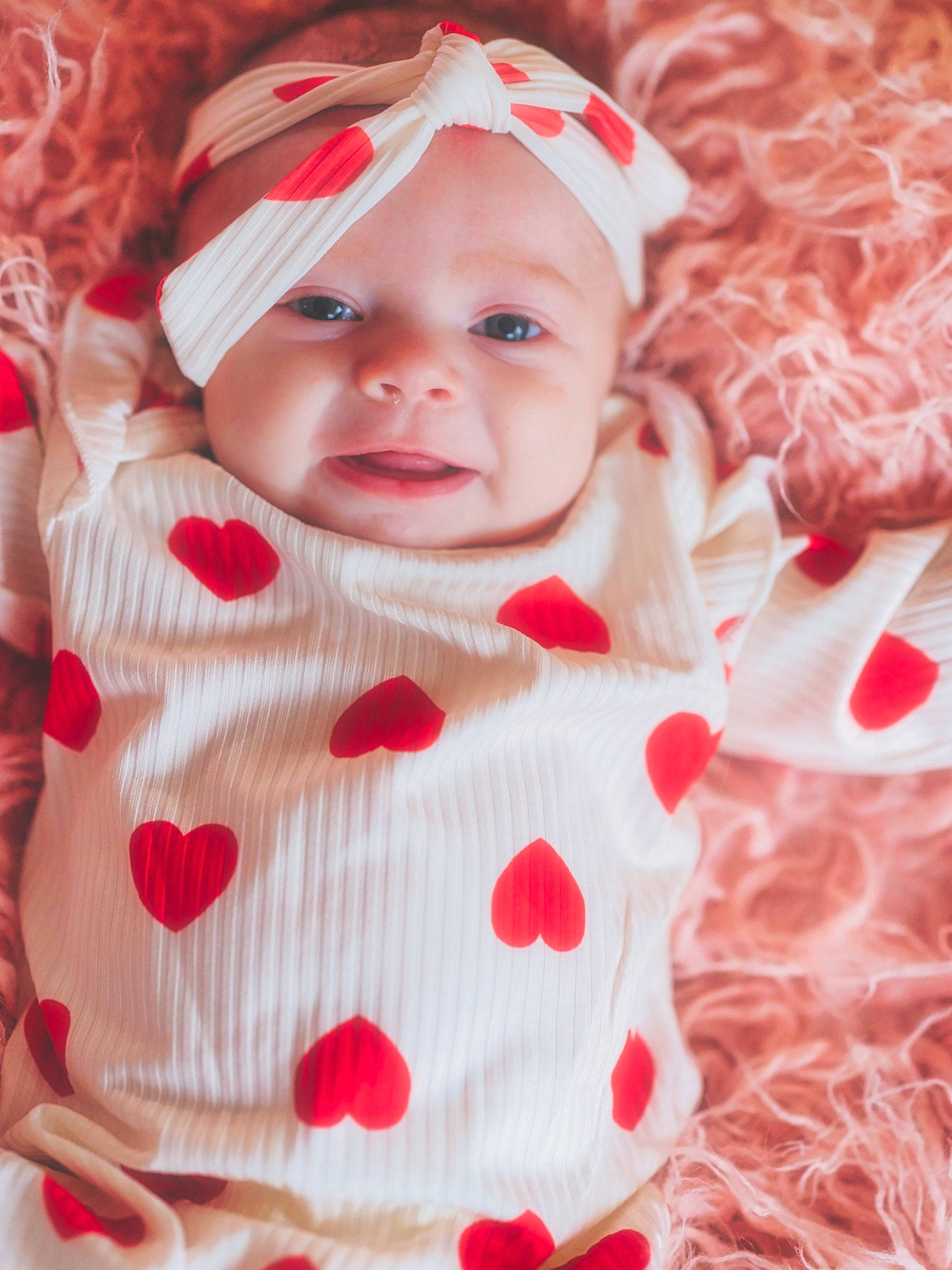 Lakelynn is registered to the contest to win money with this photo: baby, baby_products, baby_toddler_clothing, cap, dress, happy, hat, headgear, headwear, lip, pattern, peach, person, pink, plaid, red, skin, sleeve, smile, textile