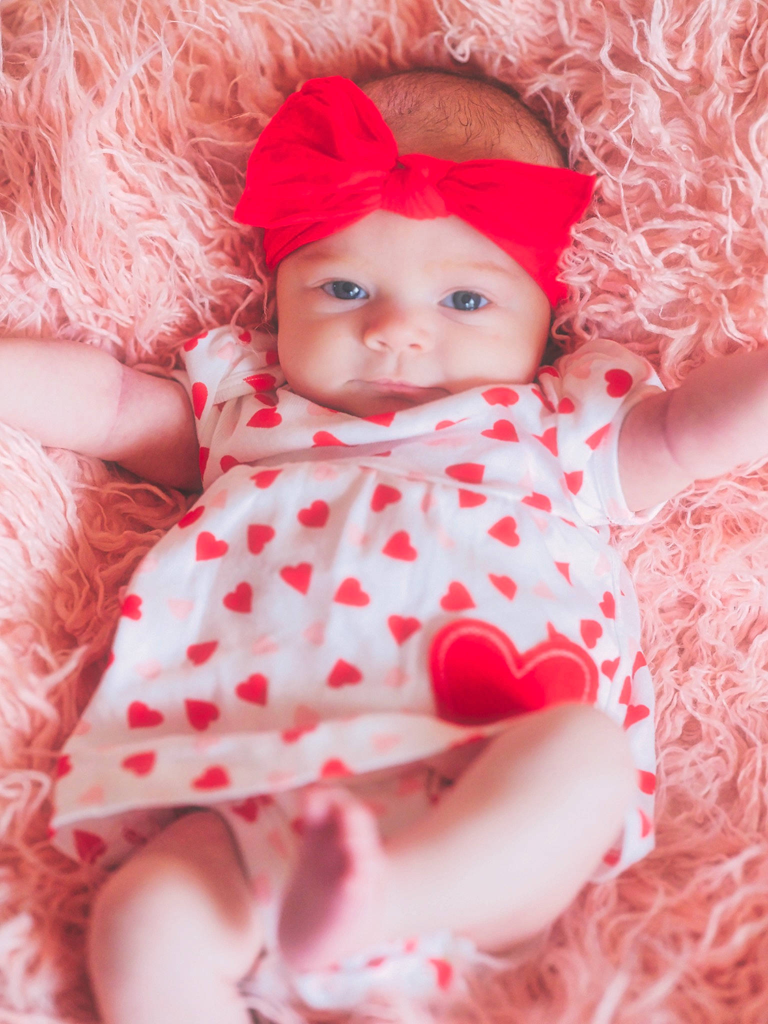 Lakelynn is registered to the contest to win money with this photo: baby, baby_toddler_clothing, cap, carmine, doll, happy, headwear, linens, lip, magenta, one_piece_garment, pattern, peach, person, pink, red, skin, sleeve, textile, toddler