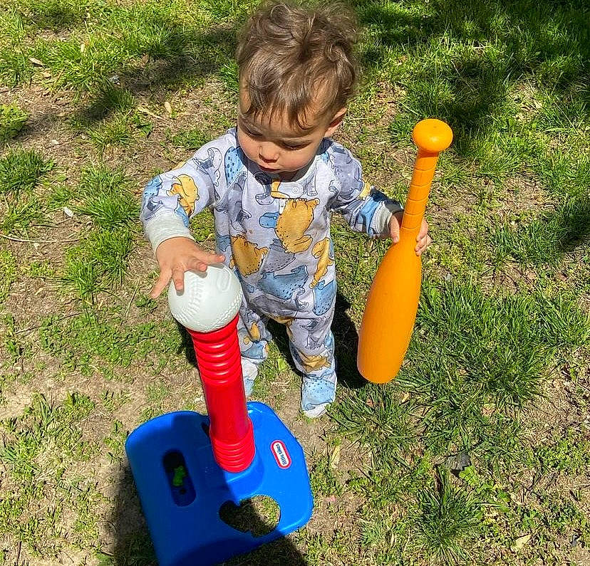 Kingston is registered to the contest to win money with this photo: baby, child, fun, grass, grass_family, leisure, people_in_nature, person, plastic, play, recreation, sitting, soil, toddler, toy, yard