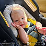 Riley joined the competition — help win amazing prizes! baby, child, infant, smiling, happy, car_seat, car, harness, seatbelt,  안전, yellow_clothing, portrait, sunlight, outdoor_light, face, hands, feet, automotive, close_up, photography