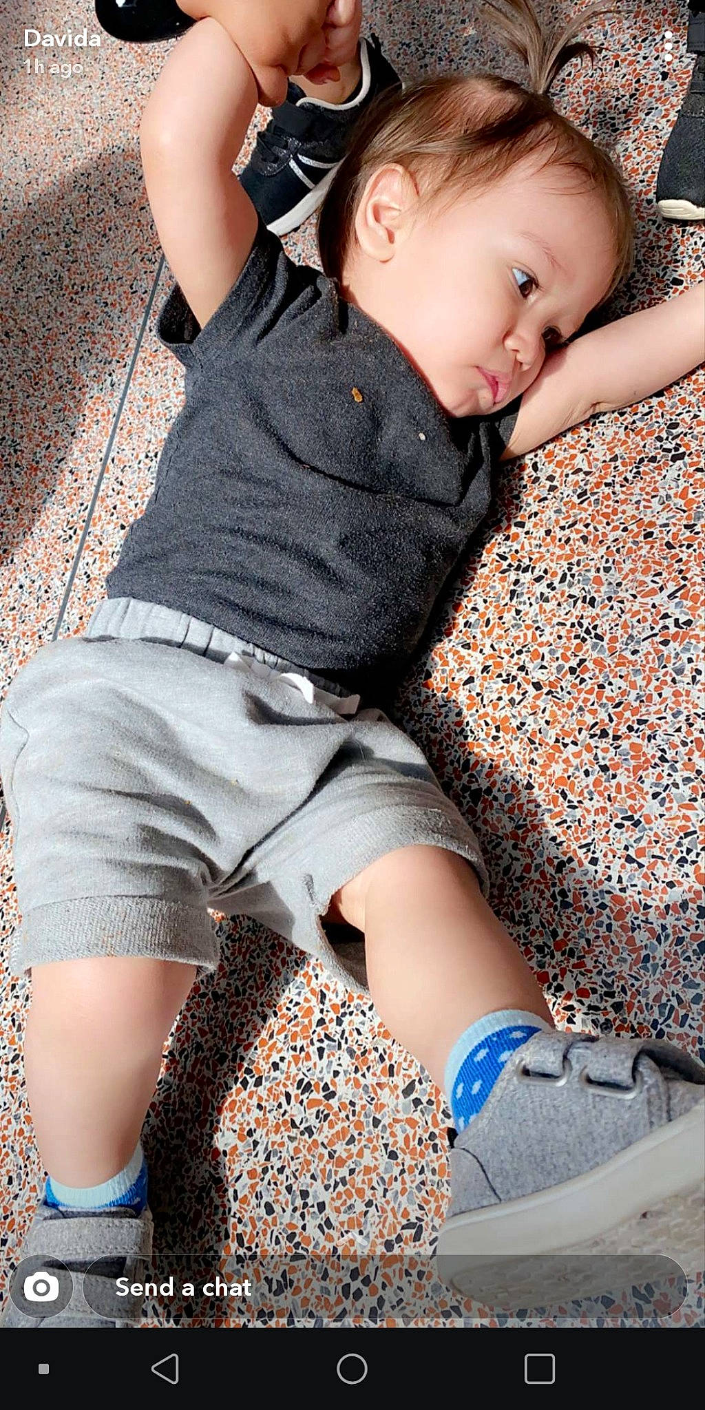 Javier is registered to the contest to win money with this photo: beauty, child, child_model, denim, footwear, human_leg, jeans, knee, leg, pattern, person, photography, play, shoe, shorts, sitting, t_shirt, thigh, toddler, trunk