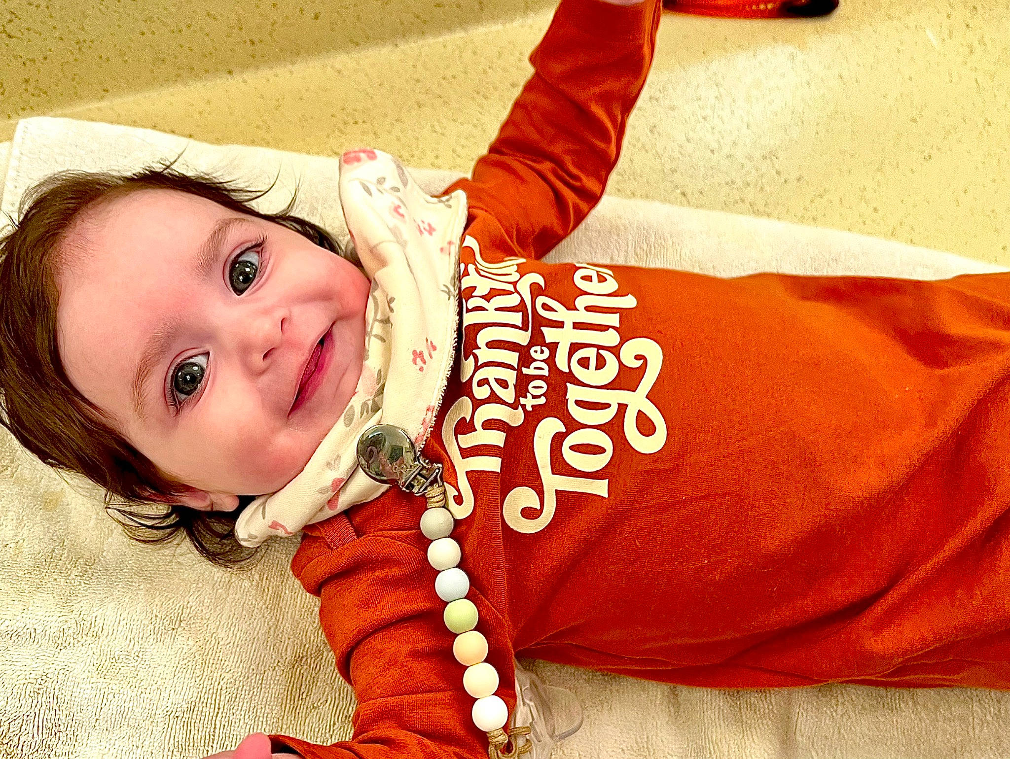 Aisha is registered to the contest to win money with this photo: baby, baby_toddler_clothing, cheek, child, child_model, fashion_accessory, flash_photography, font, fun, fur, happy, hat, joy, laugh, orange, peach, person, portrait_photography, sitting, sleeve