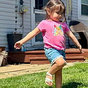 Waverly joined the competition — help win amazing prizes! casual_clothing, child, daylight, denim_shorts, girl, grass, happy, house, lawn, necklace, outdoor, pink_tshirt, playful, posing, sandals, smiling, steps, summer, sunny, young
