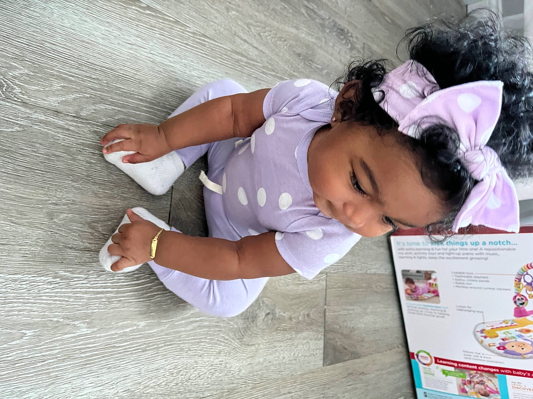 Amiri joined the competition — help win amazing prizes! arm, beauty, child, elbow, eyewear, fun, gesture, hand, happy, human_leg, knee, learning, leisure, person, play, recreation, room, sitting, t_shirt, toddler