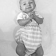 Arthur joined the competition — help win amazing prizes! baby, baby_boy, baby_girl, child, clothing, cute, expression, face, hands, happy, infant, lying_down, monochrome, person, portrait, romper, smiling, socks, soft_surface, young