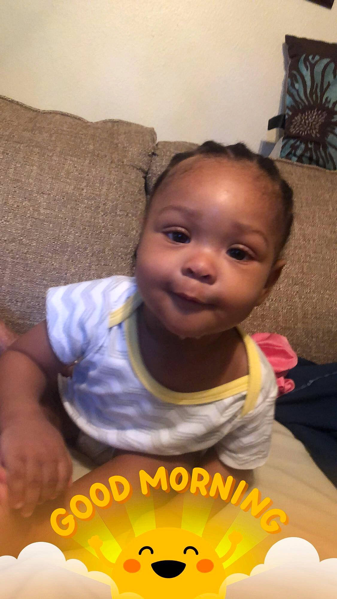 Solomon joined the competition — help win amazing prizes! baby, cheek, child, face, facial_expression, forehead, happy, head, lip, mouth, nose, person, photo_caption, skin, smile, toddler, tummy_time, yellow