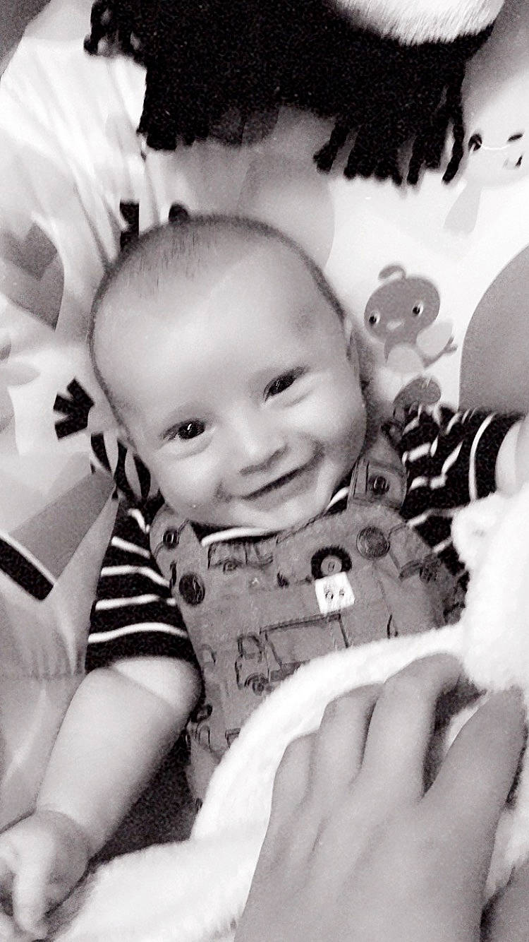 Dayton is registered to the contest to win money with this photo: baby, black, black_and_white, cheek, child, eye, face, finger, hand, head, joy, monochrome, monochrome_photography, nose, person, photograph, photography, smile, snapshot, stock_photography