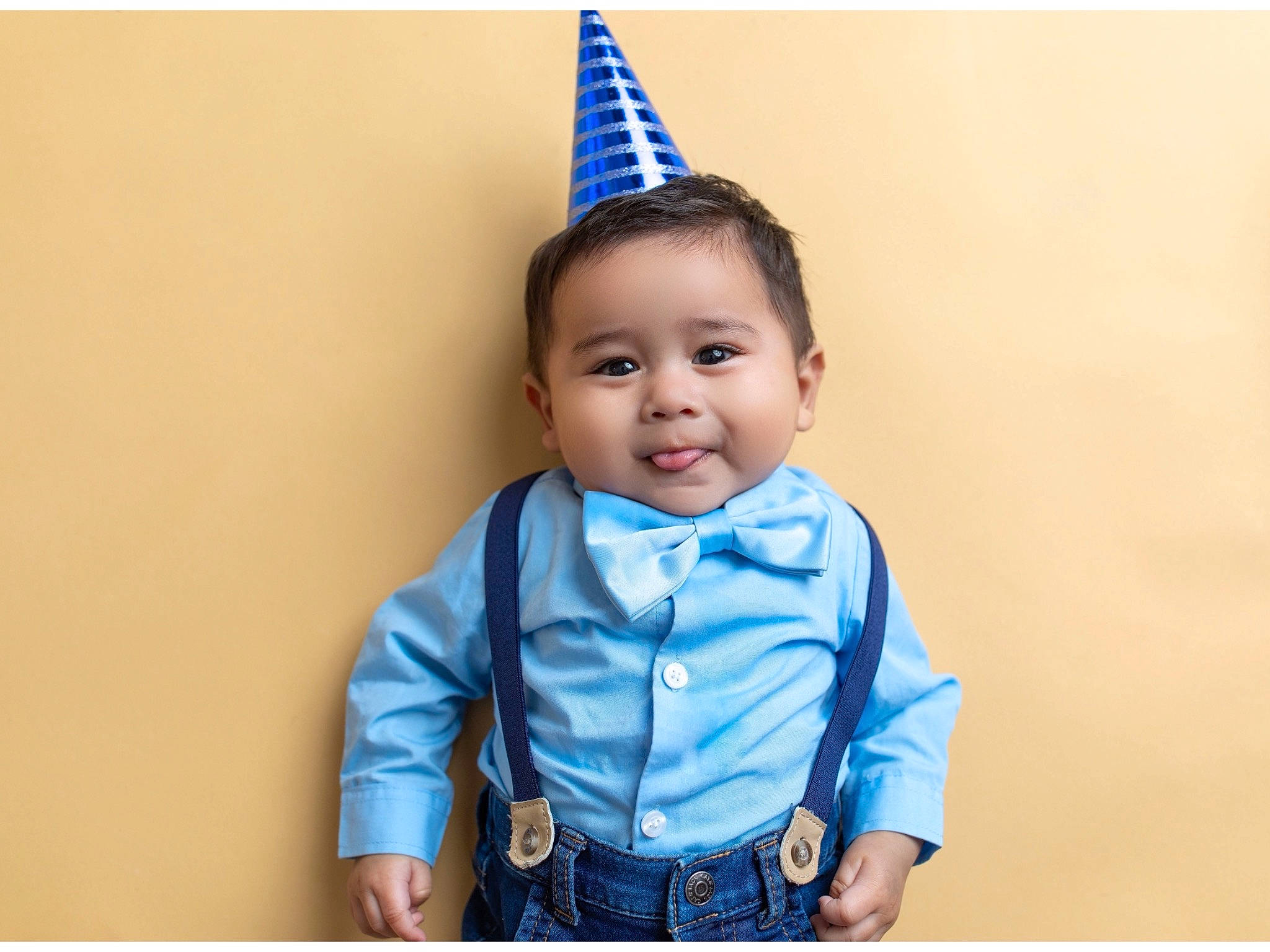 Alejandro is registered to the contest to win money with this photo: azure, baby_toddler_clothing, clothing, collar, cone, costume_hat, dress_shirt, electric_blue, eye, face, happy, head, headgear, human_body, joy, neck, outerwear, party_hat, person, sleeve