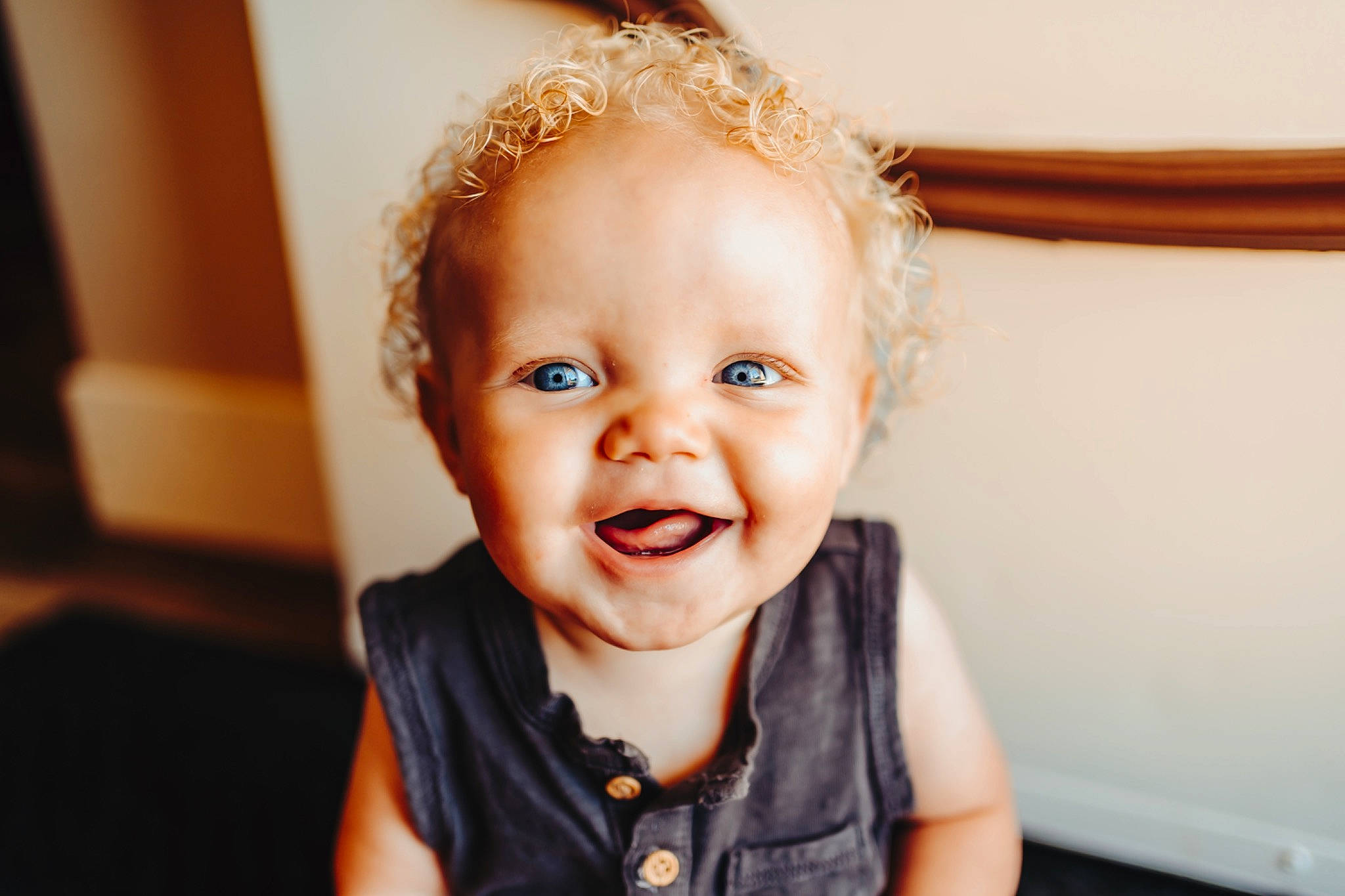 Declan is registered to the contest to win money with this photo: arm, baby, baby_toddler_clothing, cheek, child, clothing, ear, eye, eyebrow, eyelash, fashion_accessory, flash_photography, happy, headband, headpiece, iris, joy, person, skin, sleeve