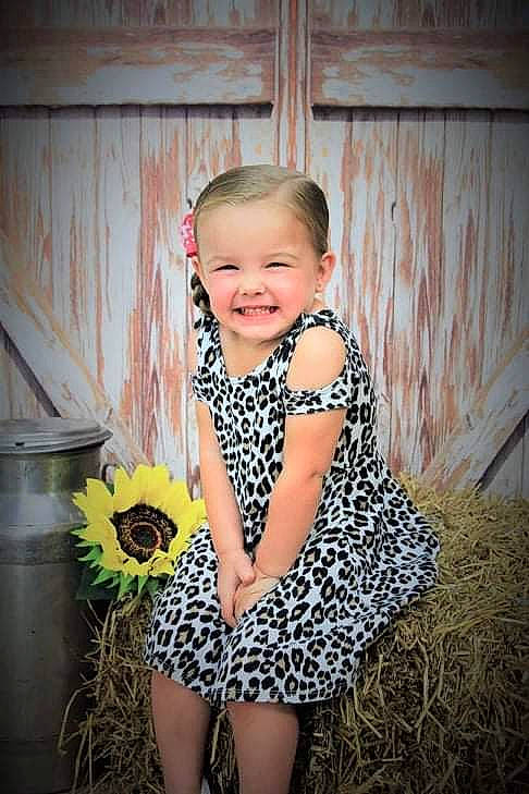 Karleigh is registered to the contest to win money with this photo: baby_toddler_clothing, child, child_model, costume, design, iris, joy, pattern, person, photograph, photography, portrait, portrait_photography, smile, toddler, yellow