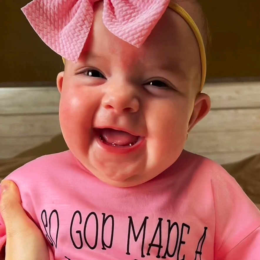 Kaelen joined the competition — help win amazing prizes! accessories, baby, babylaughing, clothing, face, happy, head, headband, laughing, person, photography, portrait, smile, t_shirt