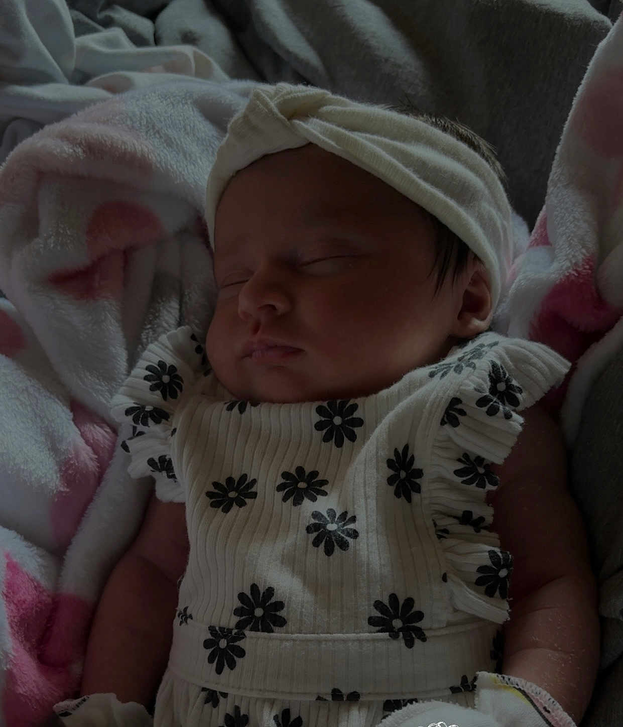Sahara joined the competition — help win amazing prizes! baby, sleeping, blanket, headband, dress, floral_pattern, infant, cozy, peaceful, cute, soft, child, portrait, indoors, rest, clothing, newborn, human, toddler, sleep