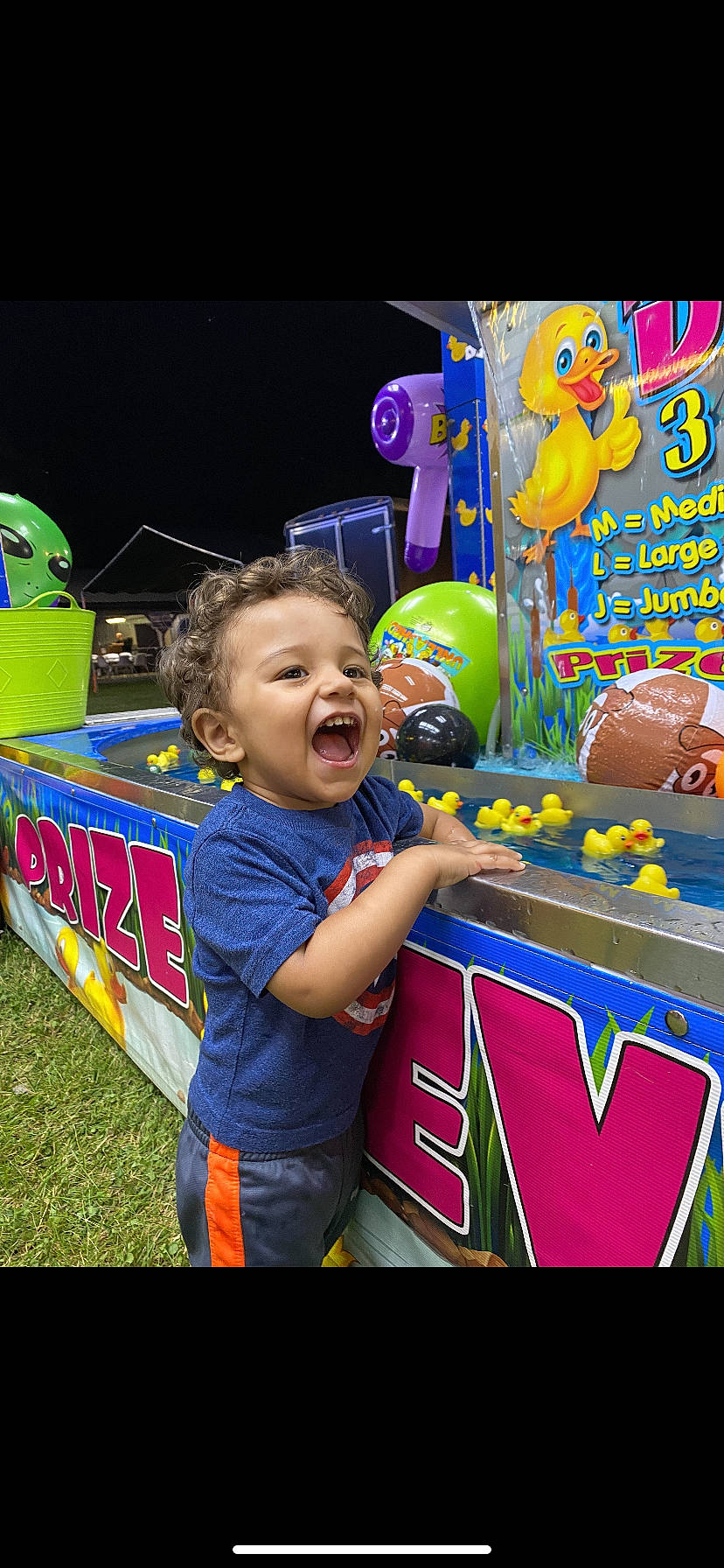 Ricardo is registered to the contest to win money with this photo: baby, child, entertainment, event, fun, games, happy, leisure, party, party_supply, performing_arts, person, play, public_event, recreation, summer, t_shirt, toddler, toy, vacation