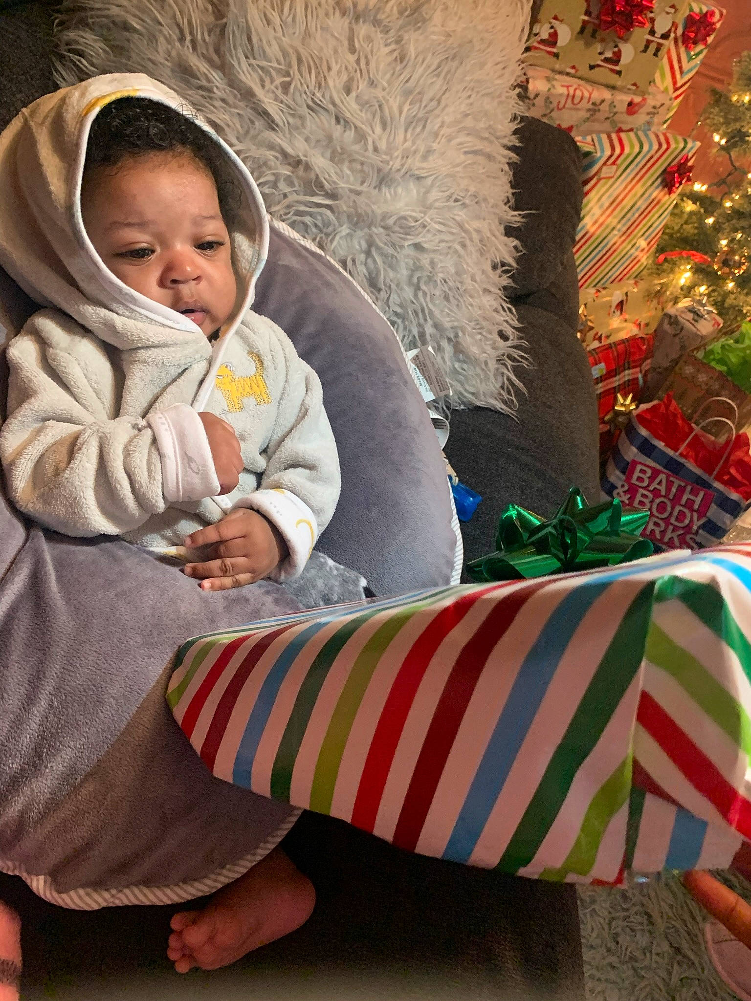 Kayshawn joined the competition — help win amazing prizes! baby, cap, child, comfort, event, flag_of_the_united_states, fun, grass, happy, holiday, jacket, knit_cap, leisure, linens, person, plant, sitting, textile, toddler, tree