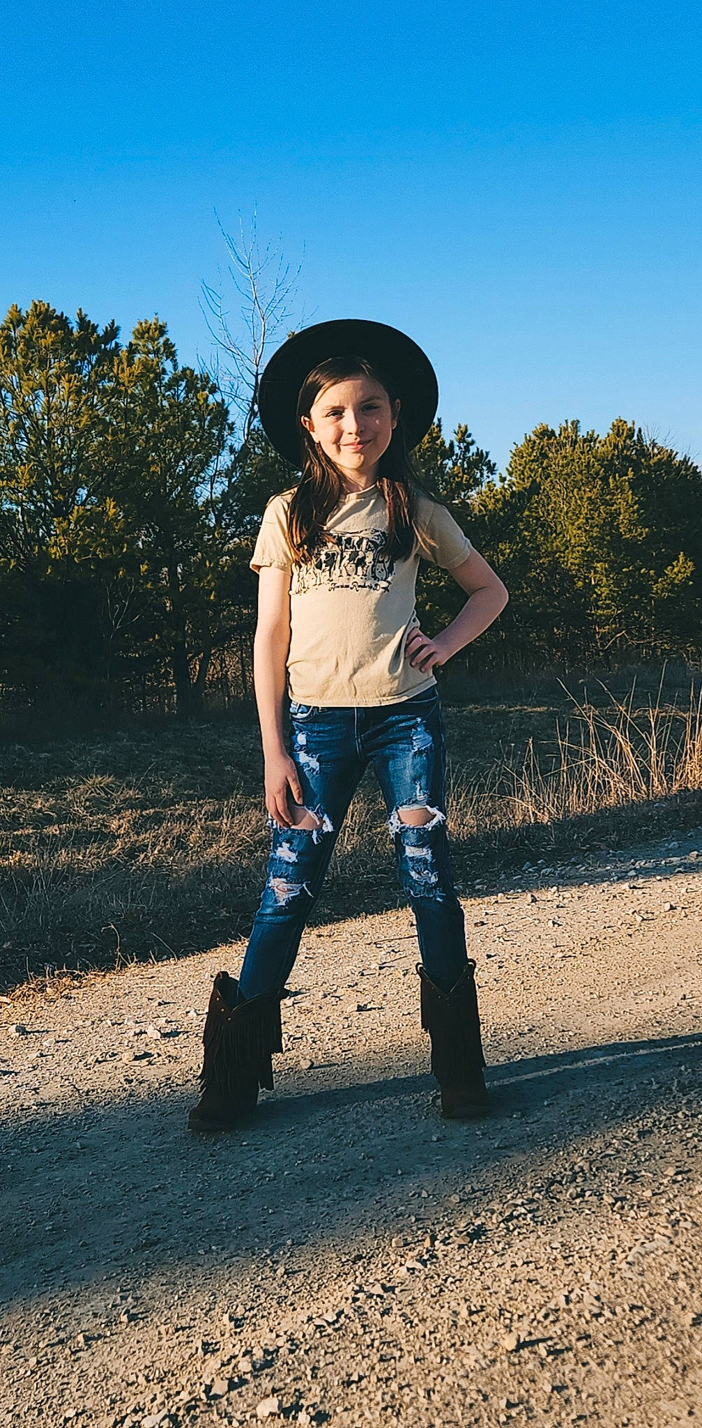 Dallas is registered to the contest to win money with this photo: azure, denim, face, flash_photography, grass, happy, hat, headgear, joy, knee, people_in_nature, person, shoulder, sky, sleeve, standing, street_fashion, sun_hat, t_shirt, thigh