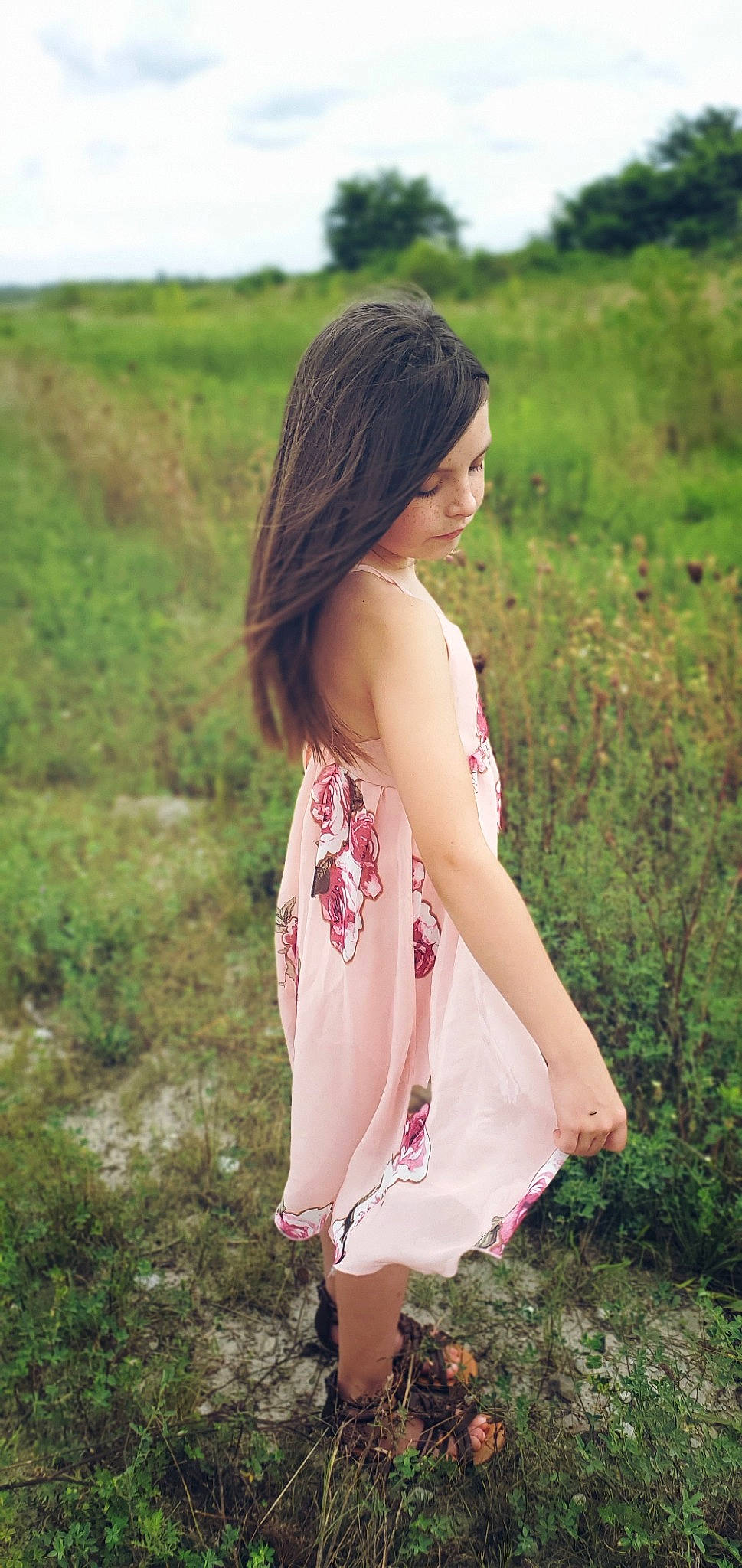 Dallas is registered to the contest to win money with this photo: black_hair, day_dress, dress, fawn, flash_photography, grass, hair, happy, human_body, lip, neck, one_piece_garment, people_in_nature, person, plant, shoulder, skin, sky, sleeve, street_fashion