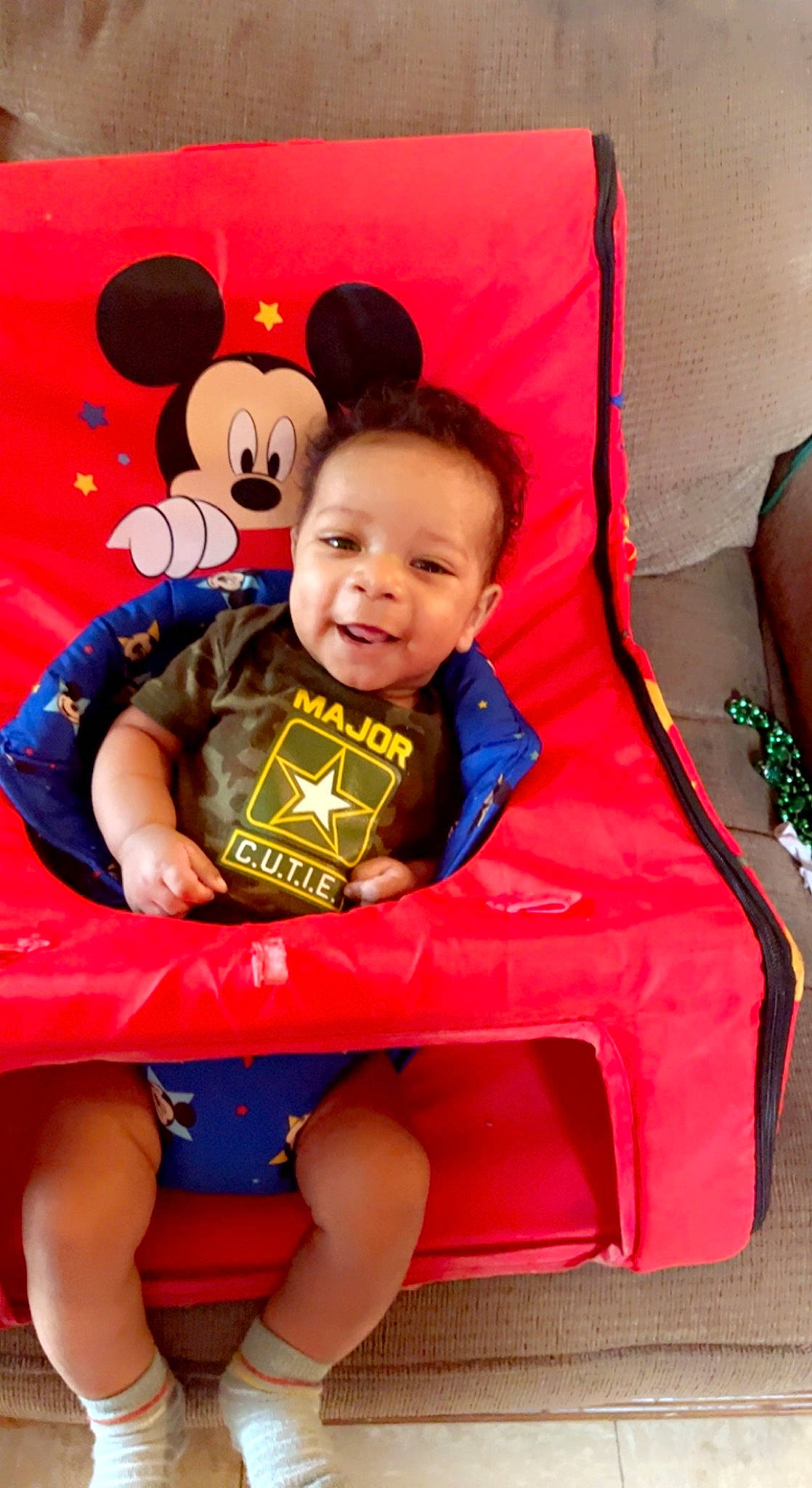 Kyrie joined the competition — help win amazing prizes! baby, baby_toddler_clothing, chair, child, comfort, event, fun, happy, inflatable, leisure, person, play, recreation, red, room, shorts, sitting, smile, t_shirt, thigh