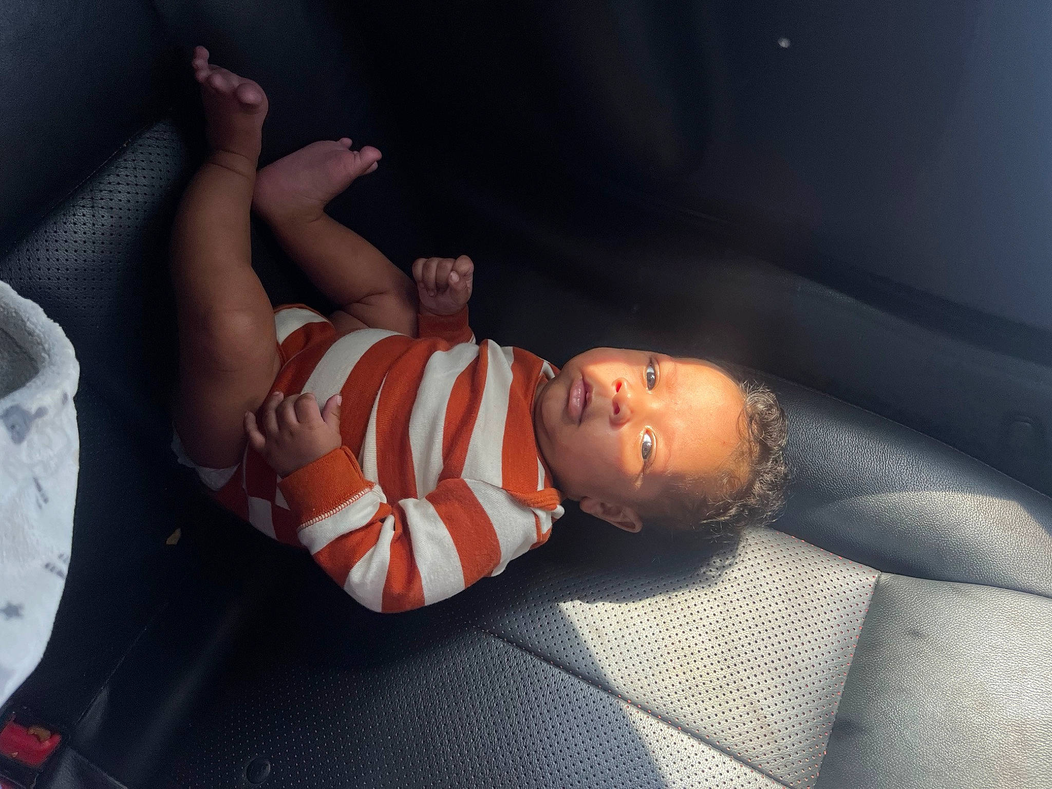 Kyrie joined the competition — help win amazing prizes! abdomen, baby, barechested, chest, child, comfort, darkness, elbow, flash_photography, flesh, fun, human_leg, knee, mouth, person, room, sleep, thigh, toddler, trunk
