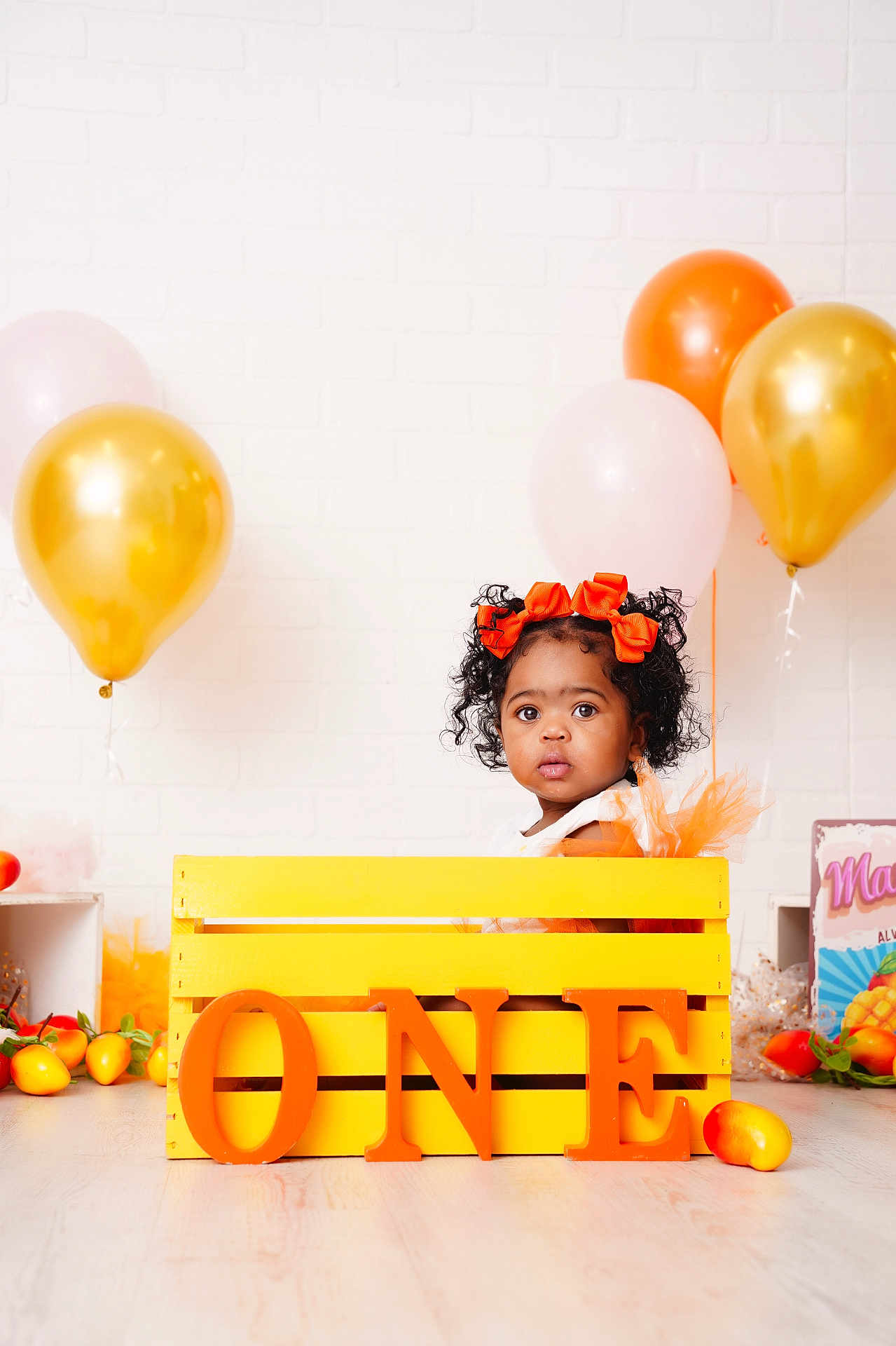 Maysia is registered to the contest to win money with this photo: balloon, birthdaycake, box, child, clothing, face, female, fun, girl, happy, hat, head, party, people, person, photography, portrait, smile, sphere, wood