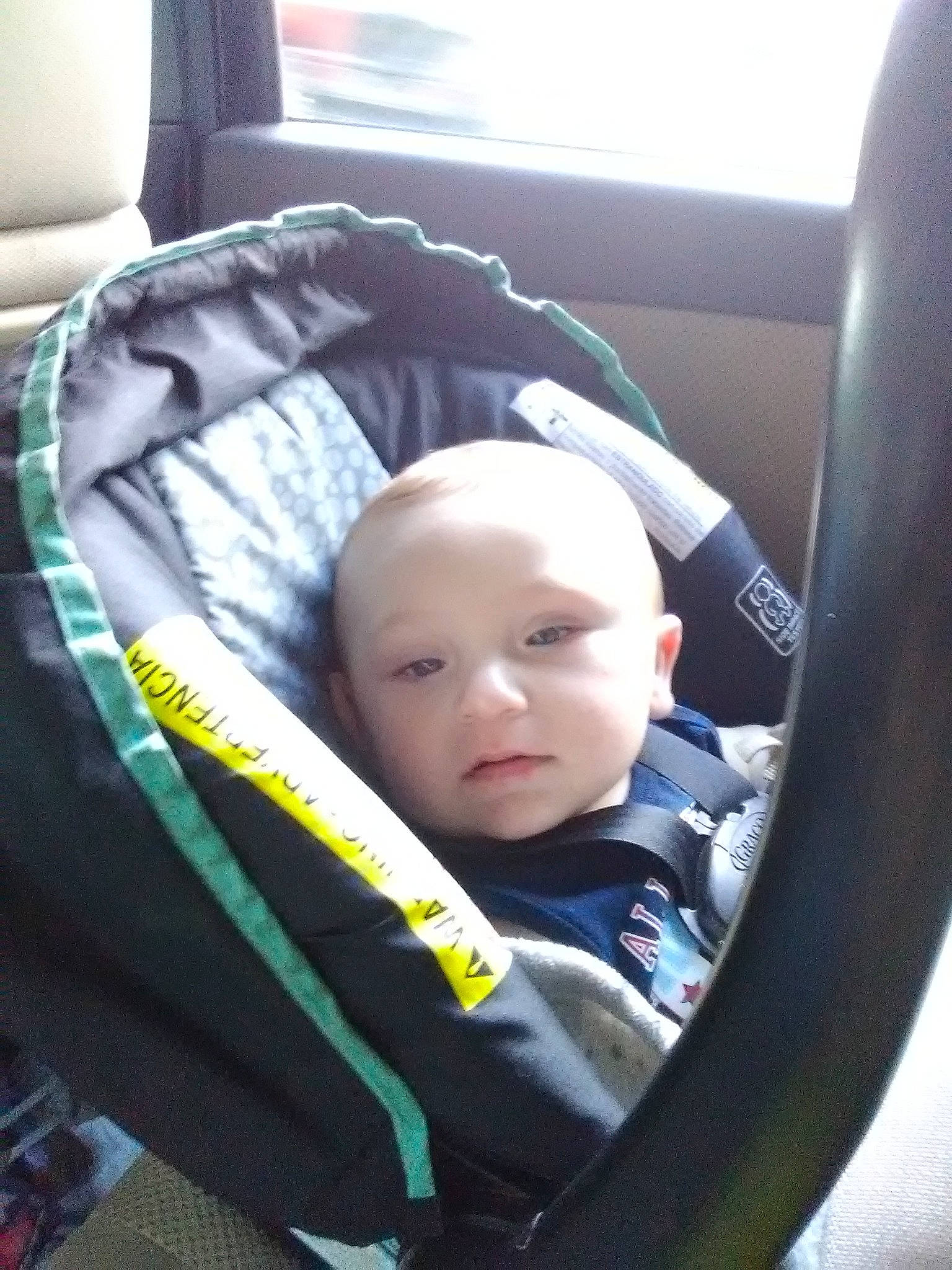Clifford is registered to the contest to win money with this photo: baby, baby_carriage, baby_in_car_seat, baby_products, car_seat, car_seat_cover, child, comfort, headwear, person, product, toddler