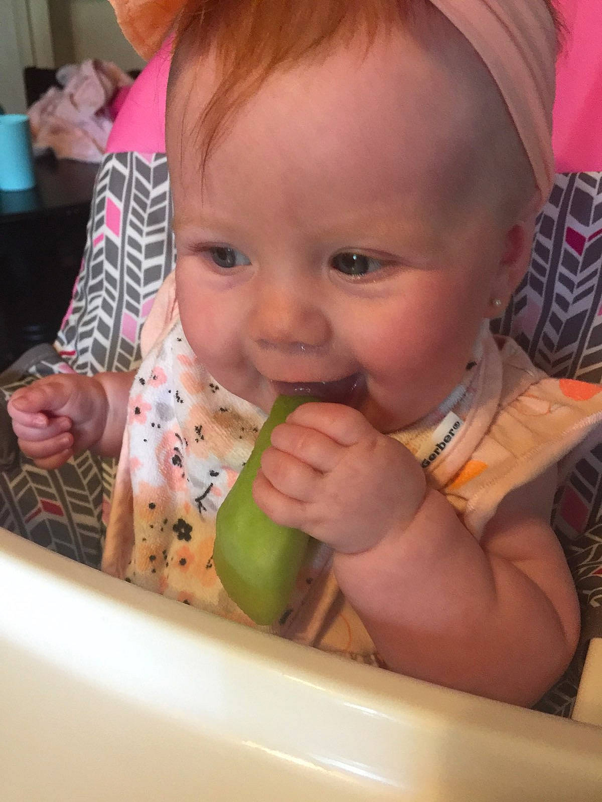 Debra is registered to the contest to win money with this photo: arm, baby, cheek, ear, eyelash, finger, food, food_craving, hand, happy, iris, lip, mouth, nail, nose, person, skin, smile, tableware, thumb