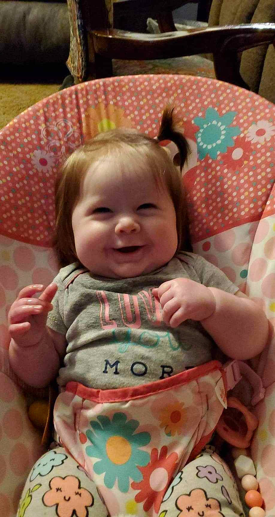 Lila joined the competition — help win amazing prizes! baby, baby_products, baby_toddler_clothing, bedding, cheek, child, comfort, green, happy, iris, linens, people, person, pink, product, room, skin, sleeve, smile, textile