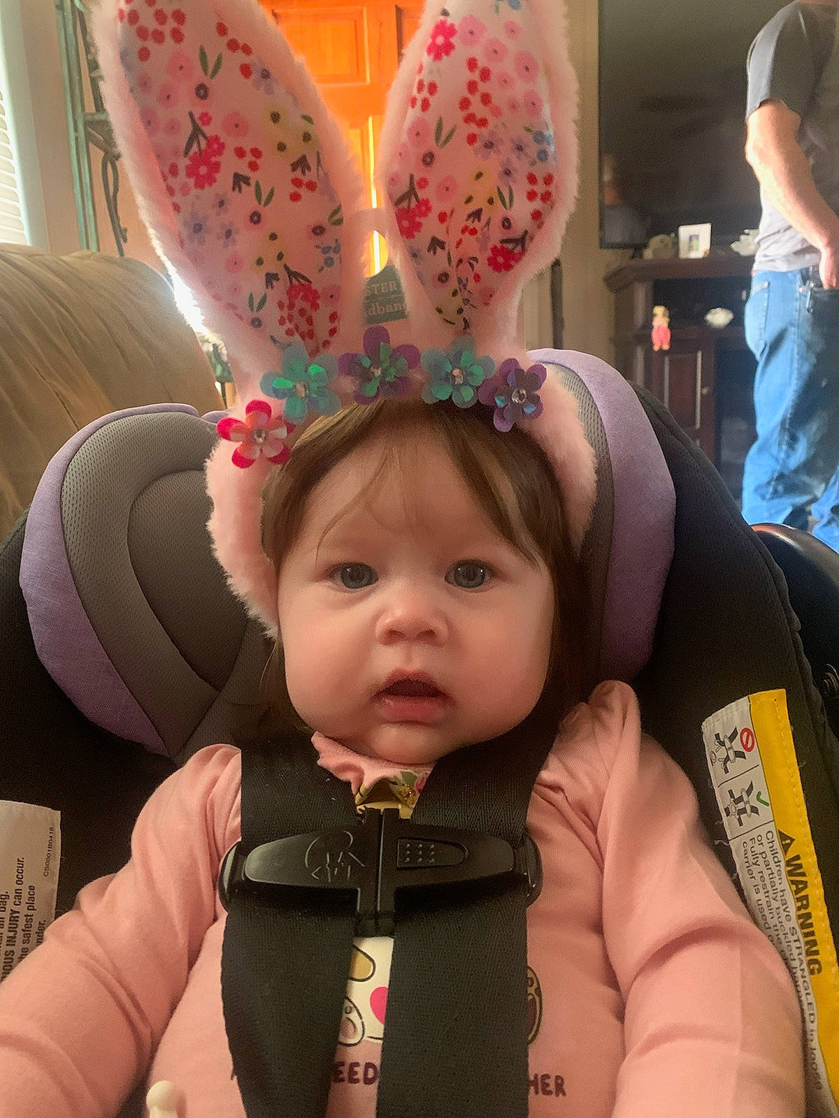 Lila is registered to the contest to win money with this photo: baby, balloon, ear, event, eye, fun, green, happy, headgear, human, nose, organ, party_supply, person, photograph, pink, skin, snapshot, textile, toddler