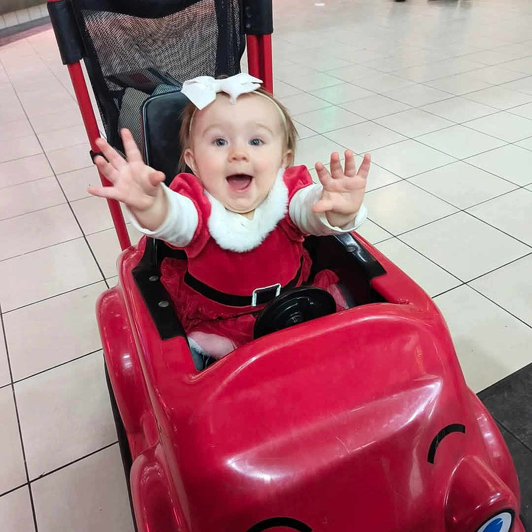 Adahlia joined the competition — help win amazing prizes! adult, baby, city, clothing, coat, face, footwear, happy, head, jacket, male, man, person, photography, portrait, road, shoe, street, stroller, urban