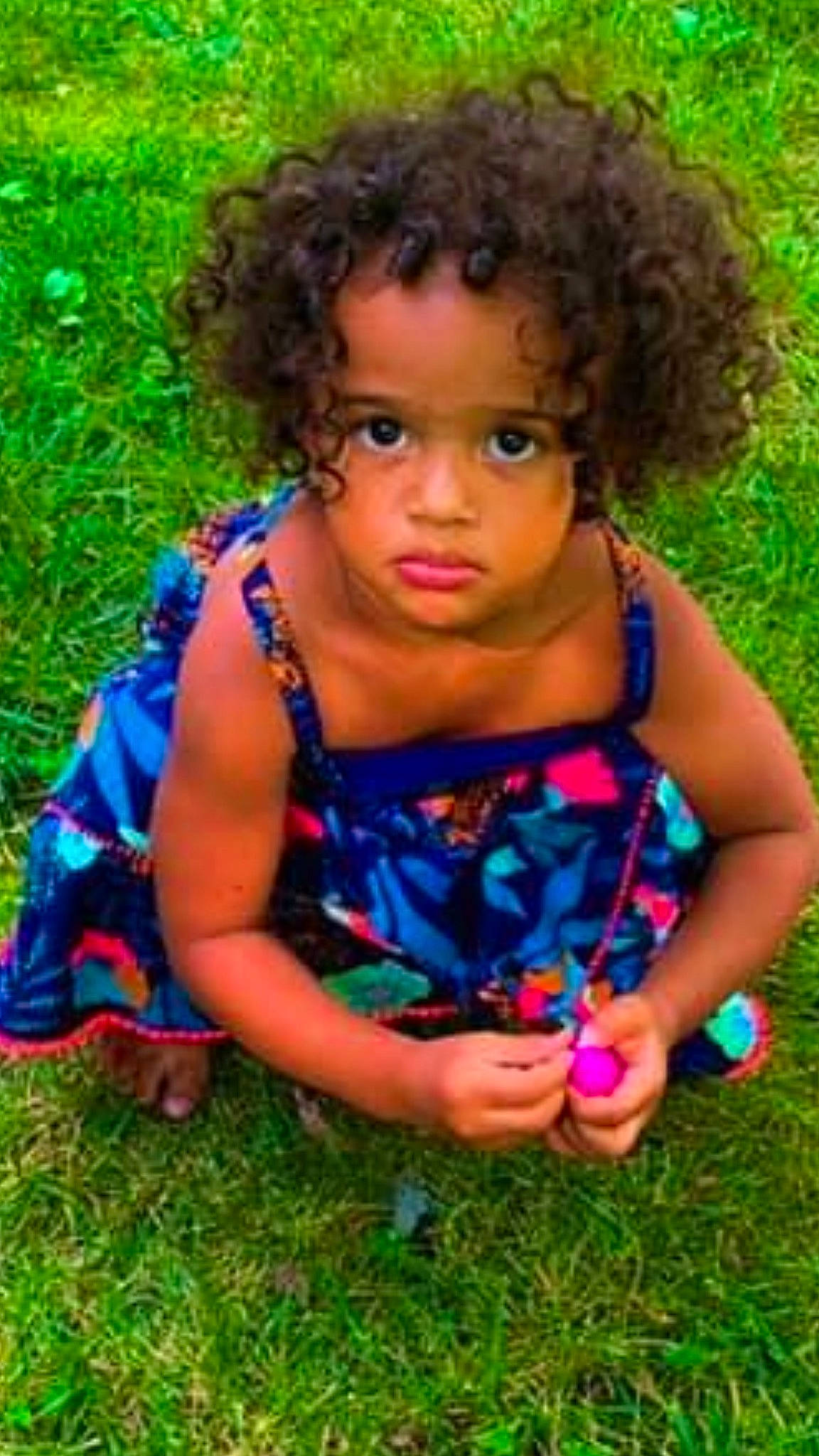 Mia Green is registered to the contest to win money with this photo: baby_toddler_clothing, botany, dress, eye, facial_expression, fun, grass, hair, hairstyle, happy, head, jheri_curl, leaf, nature, people_in_nature, person, plant, skin, summer, toddler