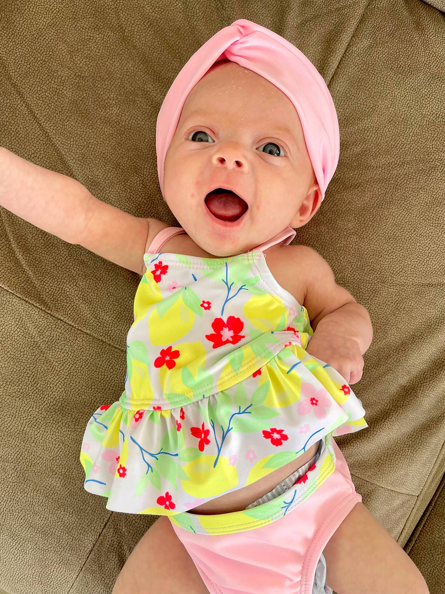 Harper is registered to the contest to win money with this photo: baby, baby_laughing, baby_products, baby_toddler_clothing, cap, cheek, child, collar, happy, headwear, magenta, one_piece_garment, pattern, person, pink, product, skin, sleeve, smile, t_shirt