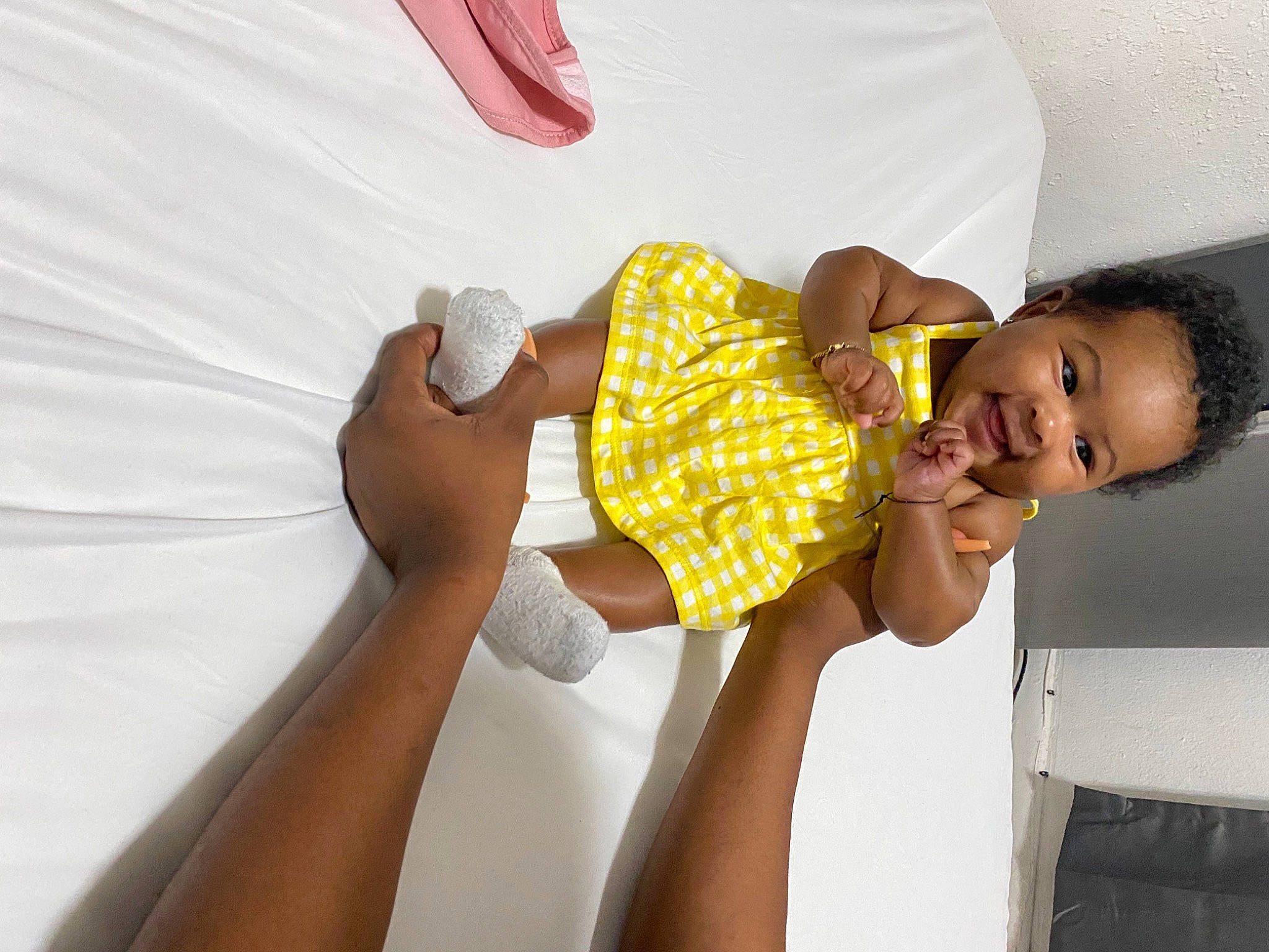 Dalani is registered to the contest to win money with this photo: abdomen, arm, baby, baby_toddler_clothing, child, comfort, elbow, finger, hand, nail, person, skin, stomach, thumb, toddler, wrist