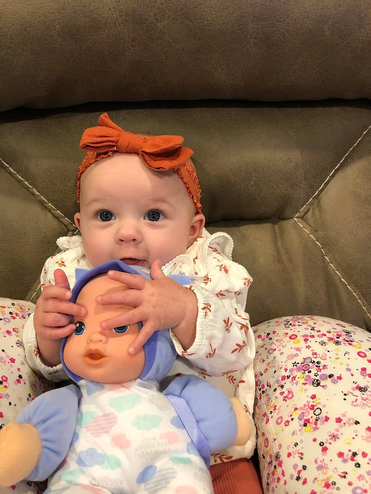 Zarah joined the competition — help win amazing prizes! abdomen, baby, baby_sleeping, baby_toddler_clothing, cheek, child, comfort, couch, doll, finger, happy, head, headwear, linens, mouth, person, sitting, skin, stuffed_toy, textile