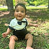 toddler, child, baby, grass, outdoor, park, sunlight, greenery, tree, nature, cute, smiling, sitting, clothing, bow_tie, happy, portrait, daytime, barefoot, young