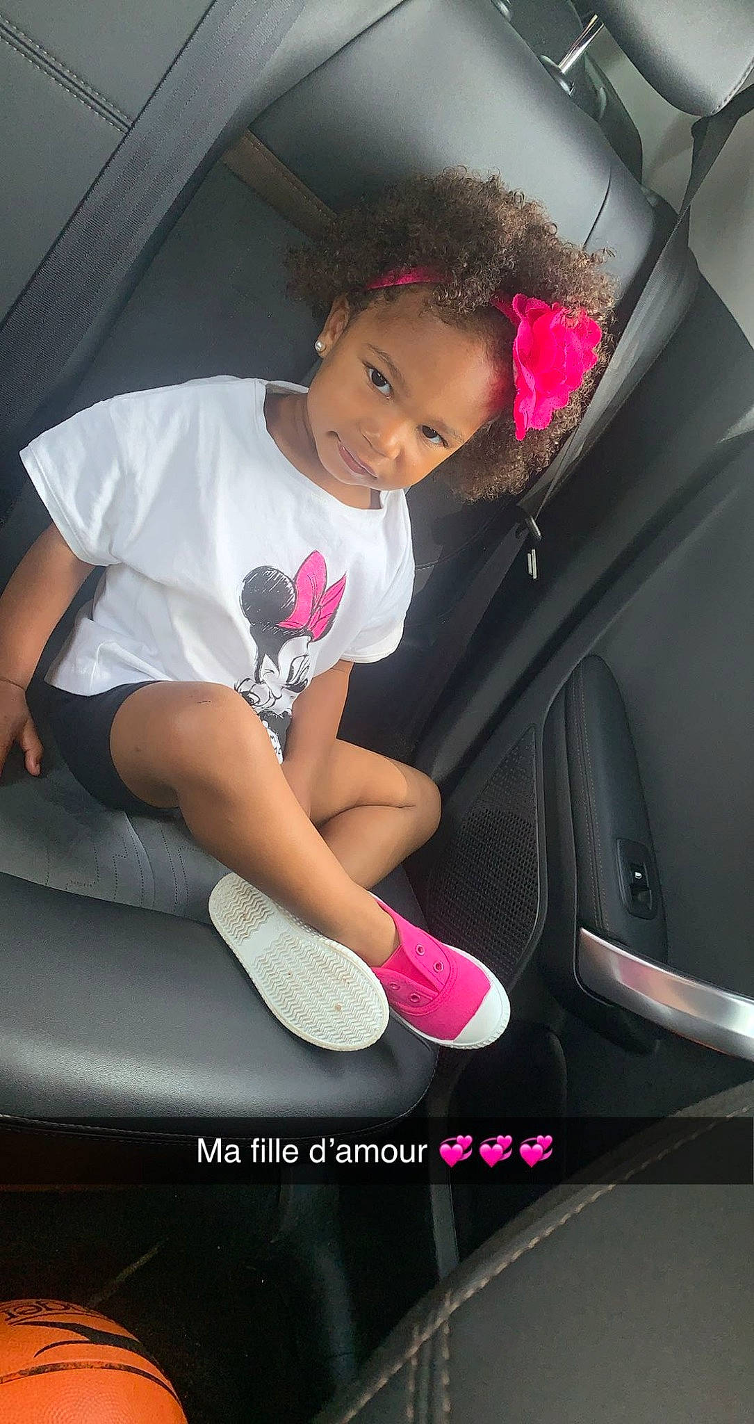 Kamila participe au concours pour gagner de l'argent avec cette photo : automotive_design, automotive_exterior, automotive_lighting, automotive_tire, black_hair, bumper, car, car_seat, cool, fashion, flash_photography, motor_vehicle, mouth, person, pink, shoe, shorts, sneakers, steering_wheel, thigh