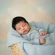 Luka joined the competition — help win amazing prizes! baby, sleeping, blanket, basket, cozy, infant, peaceful, soft, pastel, portrait, newborn, cute, child, hands, face, knitted_blanket, resting, indoors, closeup, calm