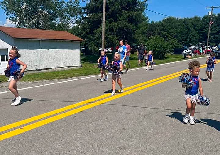 Madalynn is registered to the contest to win money with this photo: asphalt, athlete, athletics, blurred, competition_event, endurance_sports, exercise, footwear, leisure, marathon, multi_sport_event, person, physical_fitness, racing, road, running, shorts, sky, sports, tree