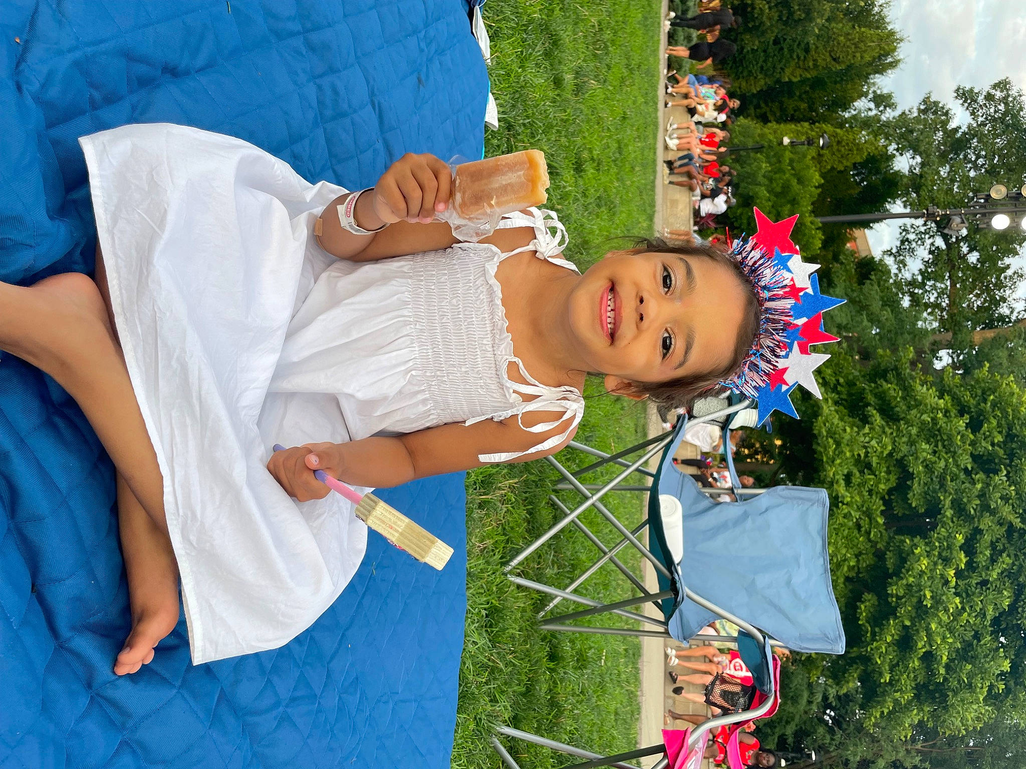 Katana is registered to the contest to win money with this photo: baby, blue, child, event, fun, grass, happy, hat, joy, leisure, people_in_nature, person, plant, pole, recreation, sky, smile, toddler, tree, vacation