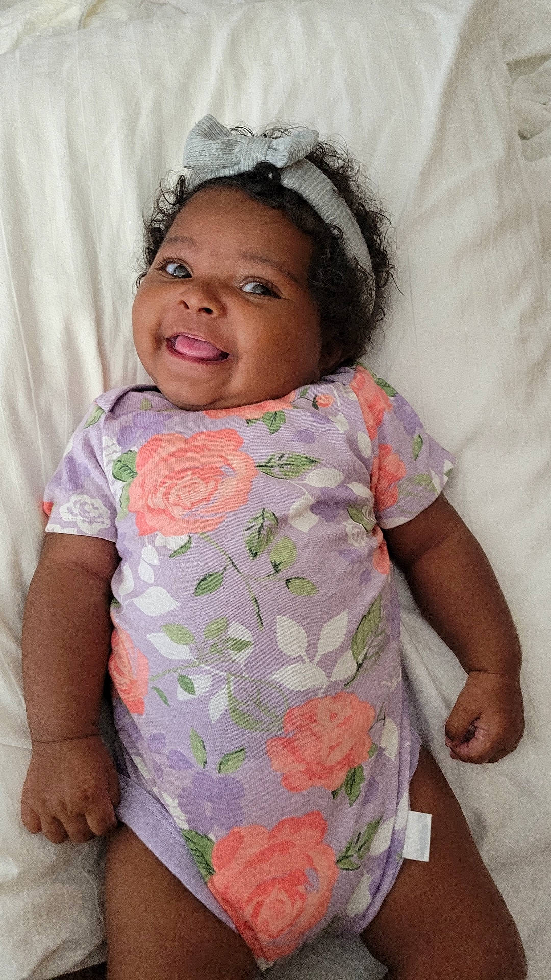 Razan is registered to the contest to win money with this photo: arm, baby_toddler_clothing, cheek, chin, comfort, eyebrow, face, facial_expression, hand, head, human_body, joy, lip, mouth, neck, nose, person, shoulder, skin, sleeve