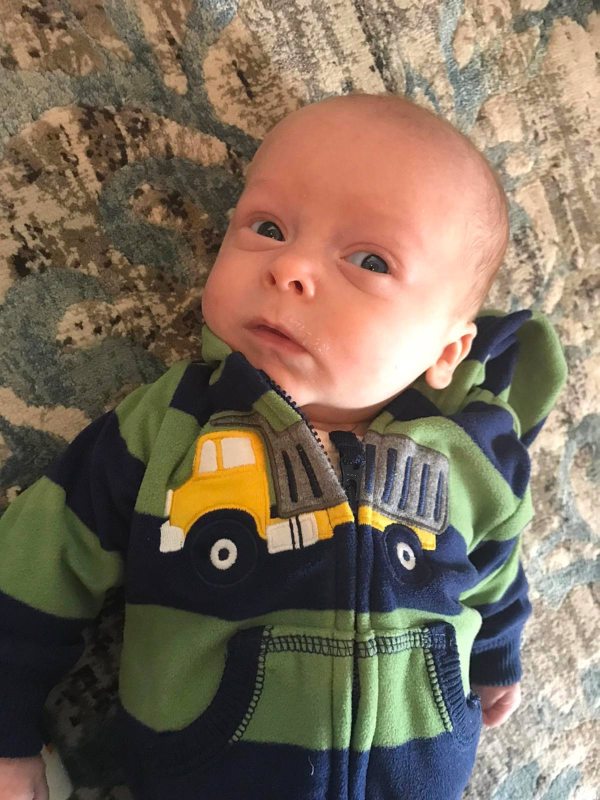 Theodore joined the competition — help win amazing prizes! baby, baby_carriage, baby_products, cheek, child, eye, head, outerwear, pattern, person, product, sleeve, smile, toddler