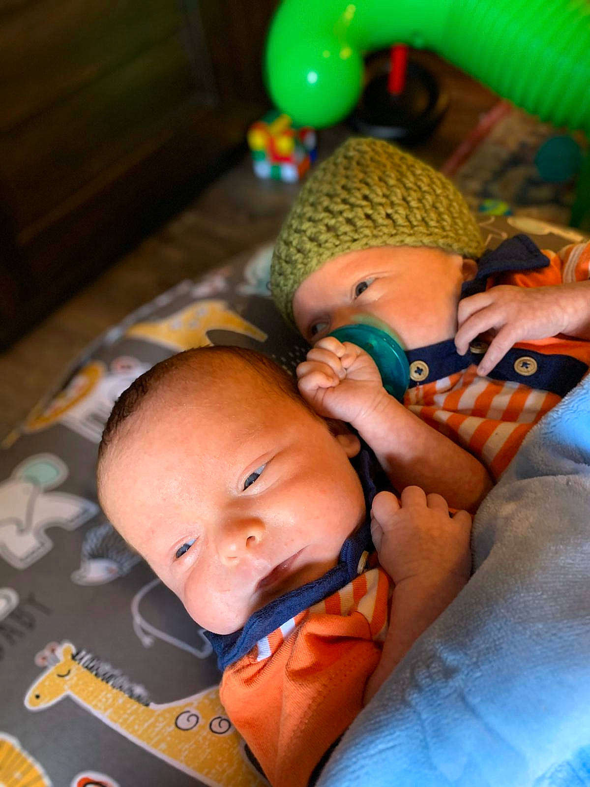 Frederick is registered to the contest to win money with this photo: baby, baby_products, bedtime, birth, brown, cheek, child, eye, finger, hand, head, nap, nose, orange, person, product, skin, sleep, textile, toddler