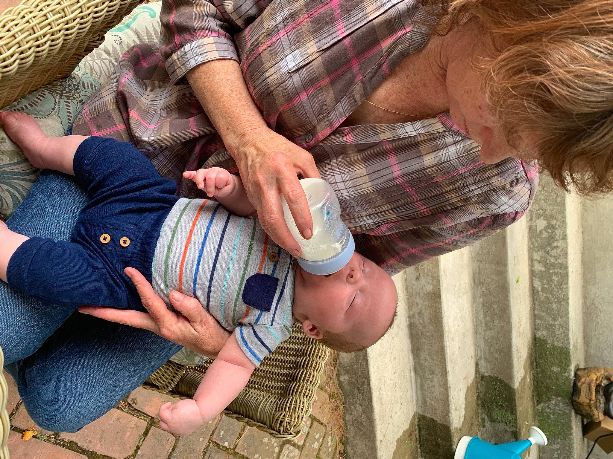 Frederick is registered to the contest to win money with this photo: baby, child, design, hand, pattern, person, plaid, product, sitting, textile, toddler, vacation