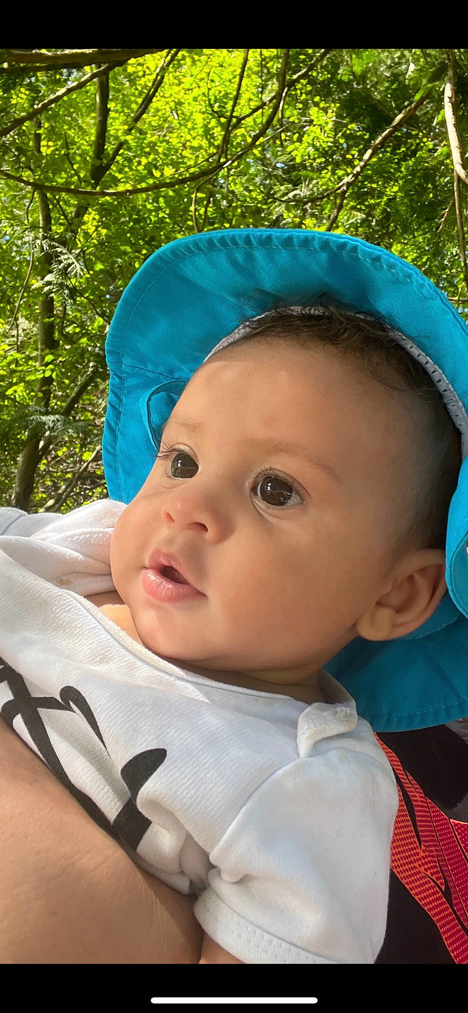 Amari joined the competition — help win amazing prizes! baby, baby_products, baby_toddler_clothing, cap, cheek, child, cool, electric_blue, eyebrow, fashion_accessory, fun, grass, happy, headgear, lip, person, personal_protective_equipment, sun_hat, toddler, tree