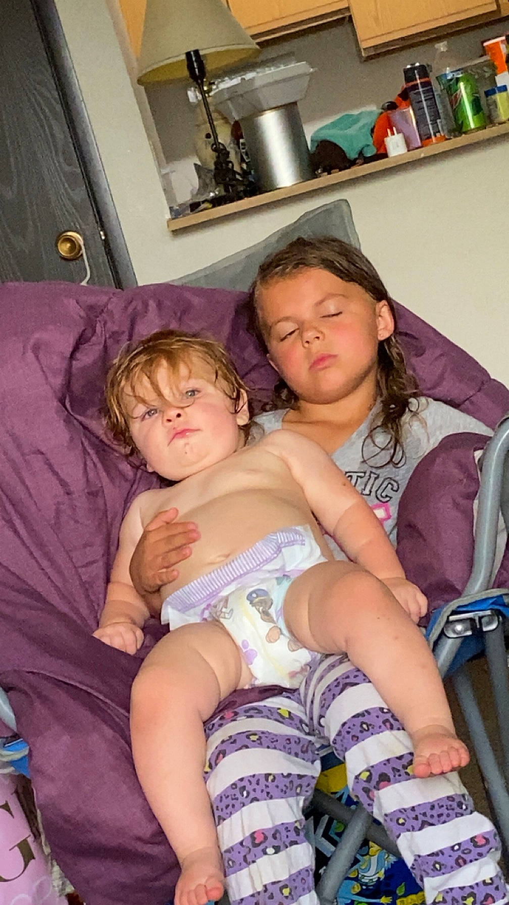 Irene-marie joined the competition — help win amazing prizes! abdomen, arm, baby, comfort, couch, event, fun, happy, human_body, kitchen_appliance, lap, leg, muscle, person, purple, room, shorts, sitting, thigh, toddler