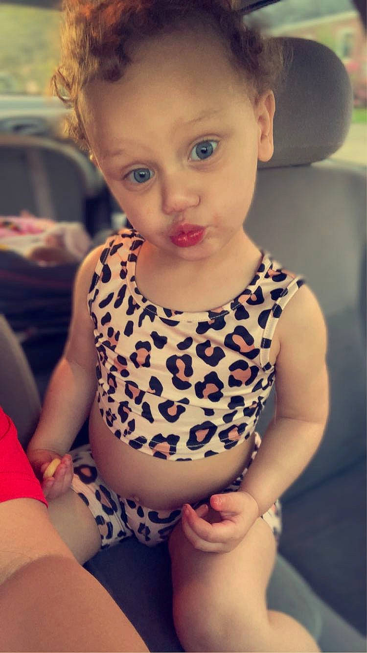 Zariah is registered to the contest to win money with this photo: baby, baby_toddler_clothing, cheek, child, cool, eyelash, face, flash_photography, hair, hairstyle, happy, iris, lip, nose, organ, person, photograph, shoulder, skin, sleeve